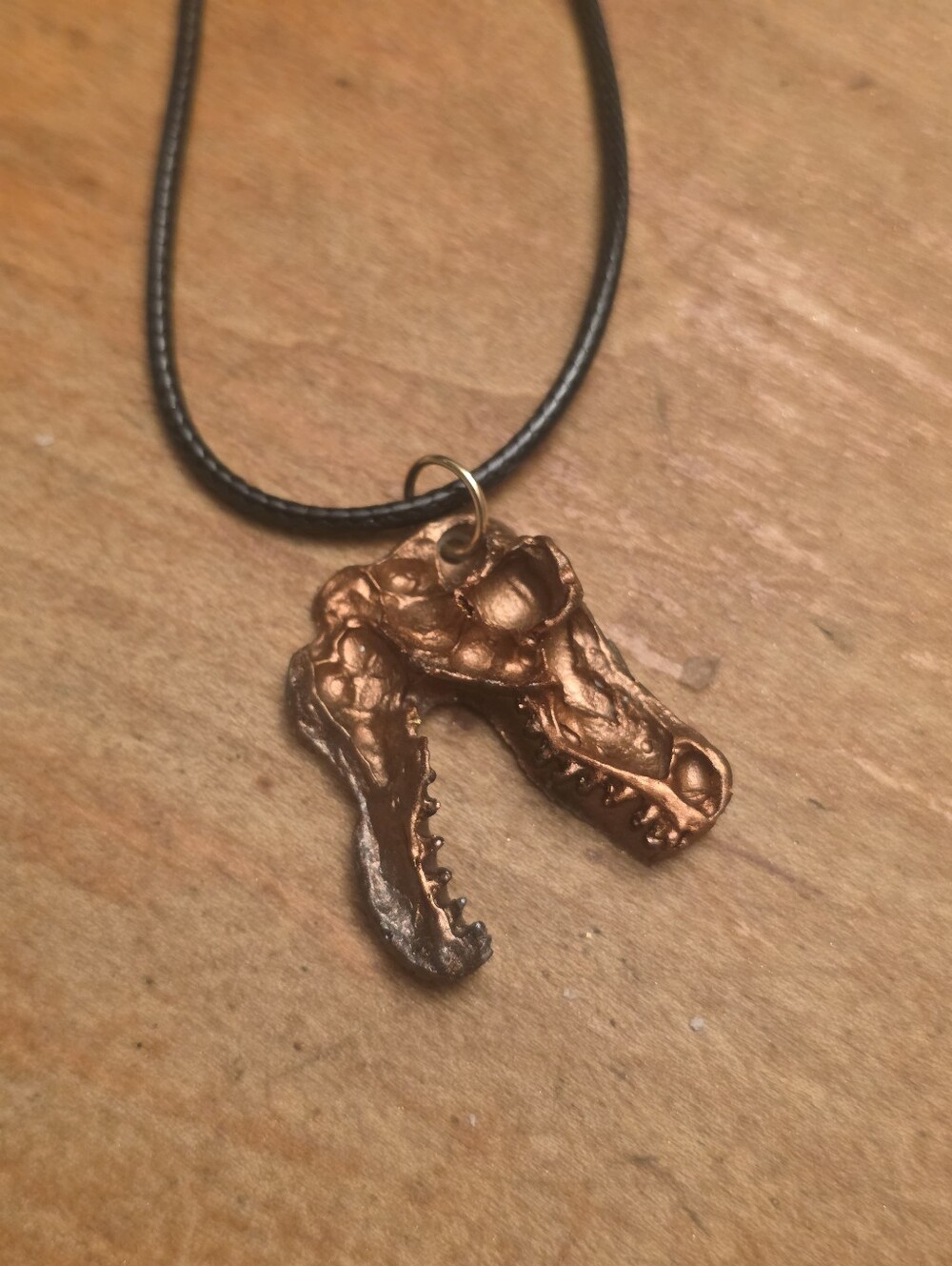 Resin Copper T-Rex Skull On Black Cord Necklace